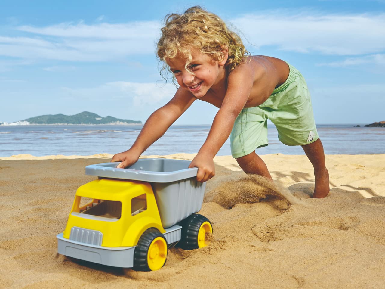 Hape Giochi autoribaltabile Carica e Trasporta camion giallo