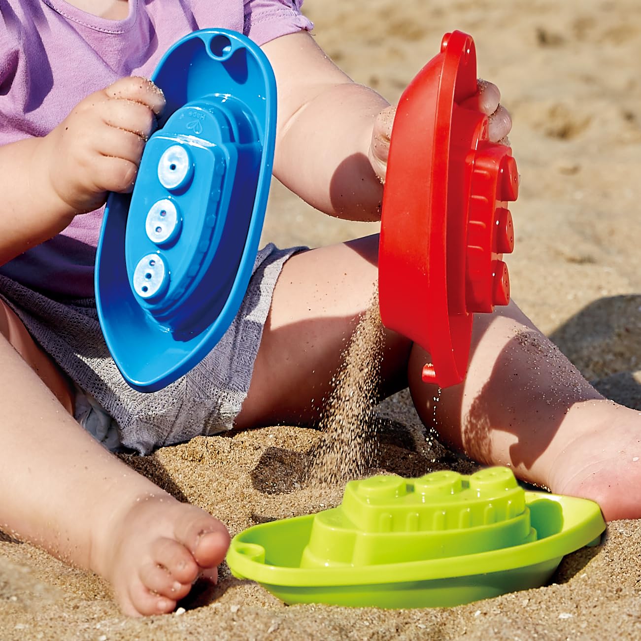 Hape Giochi da spiaggia Barchette impilabili 3 pezzi multicolore forate