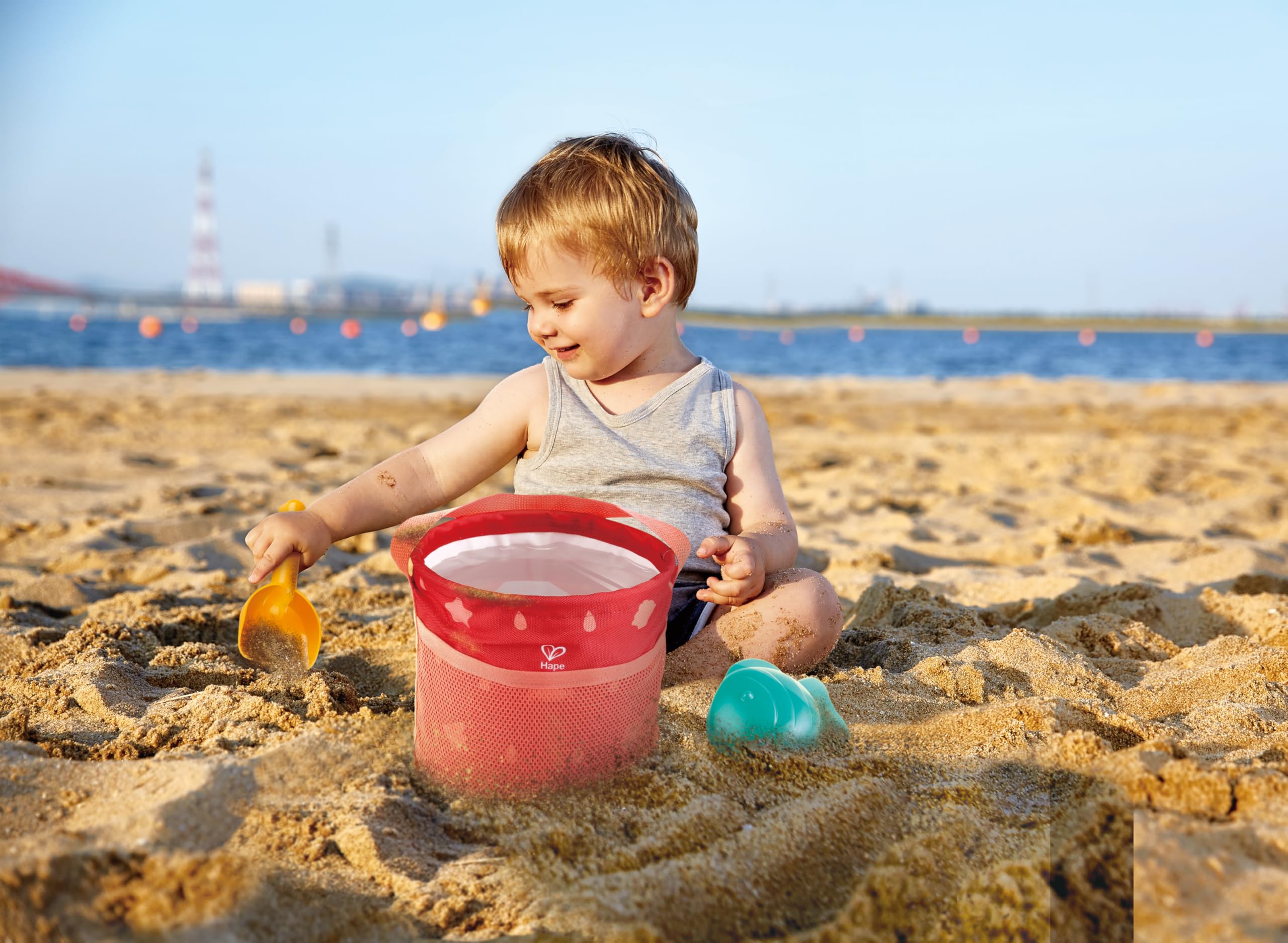 Hape Giochi da spiaggia set pieghevole con secchiello e paletta