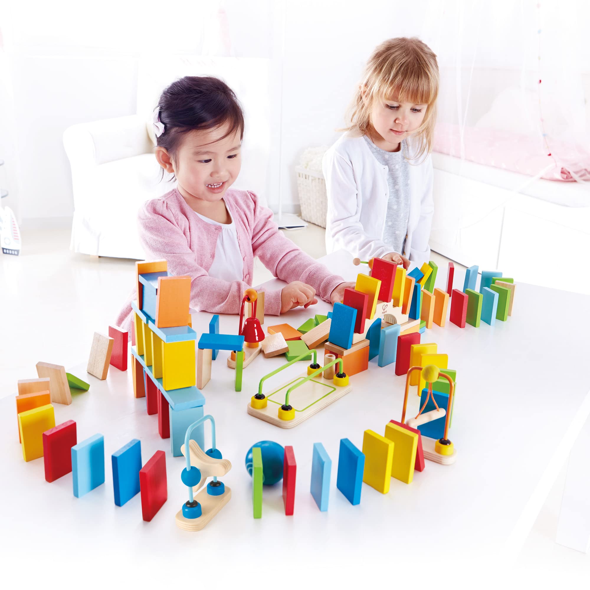 Hape Montare e costruire Set di Domino Dinamici domino in legno 107 pezzi multicolore