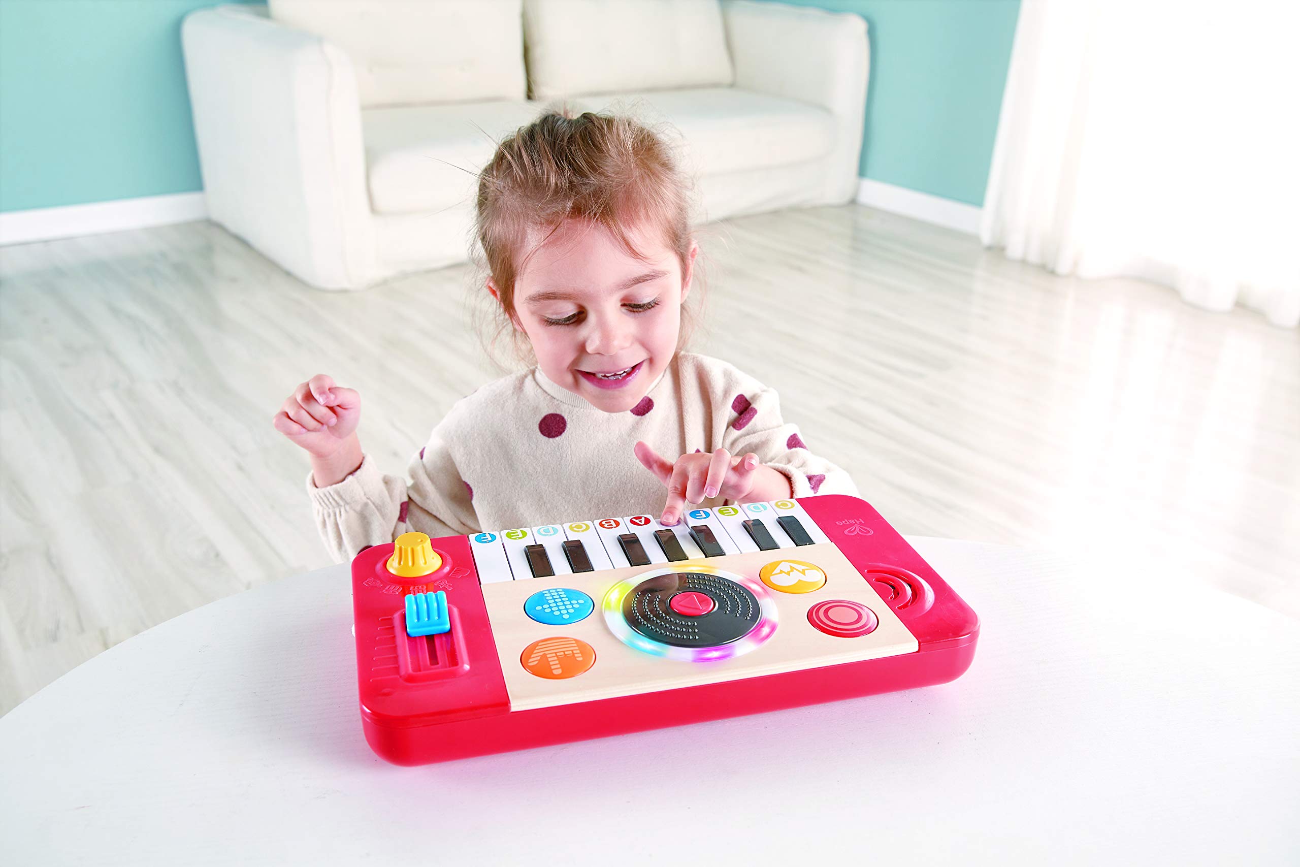 Hape Giochi musicali Studio DJ Mix & Spin giocattolo musicale con luci