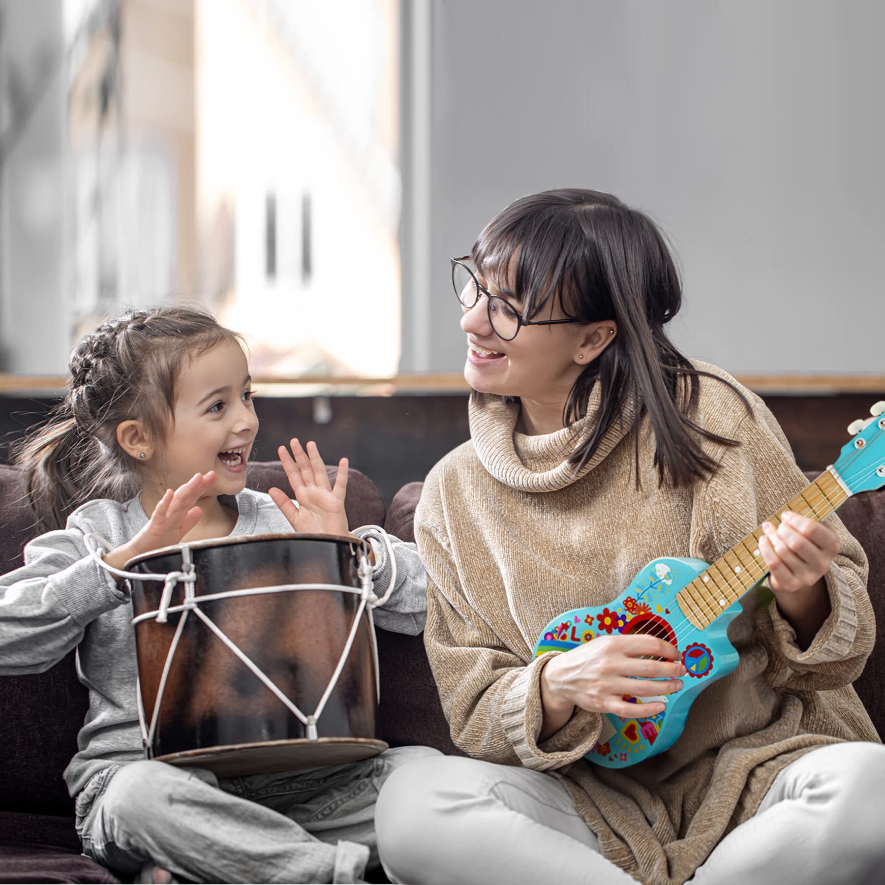 Hape Giochi musicali Chitarra Figli dei Fiori blu guitalele