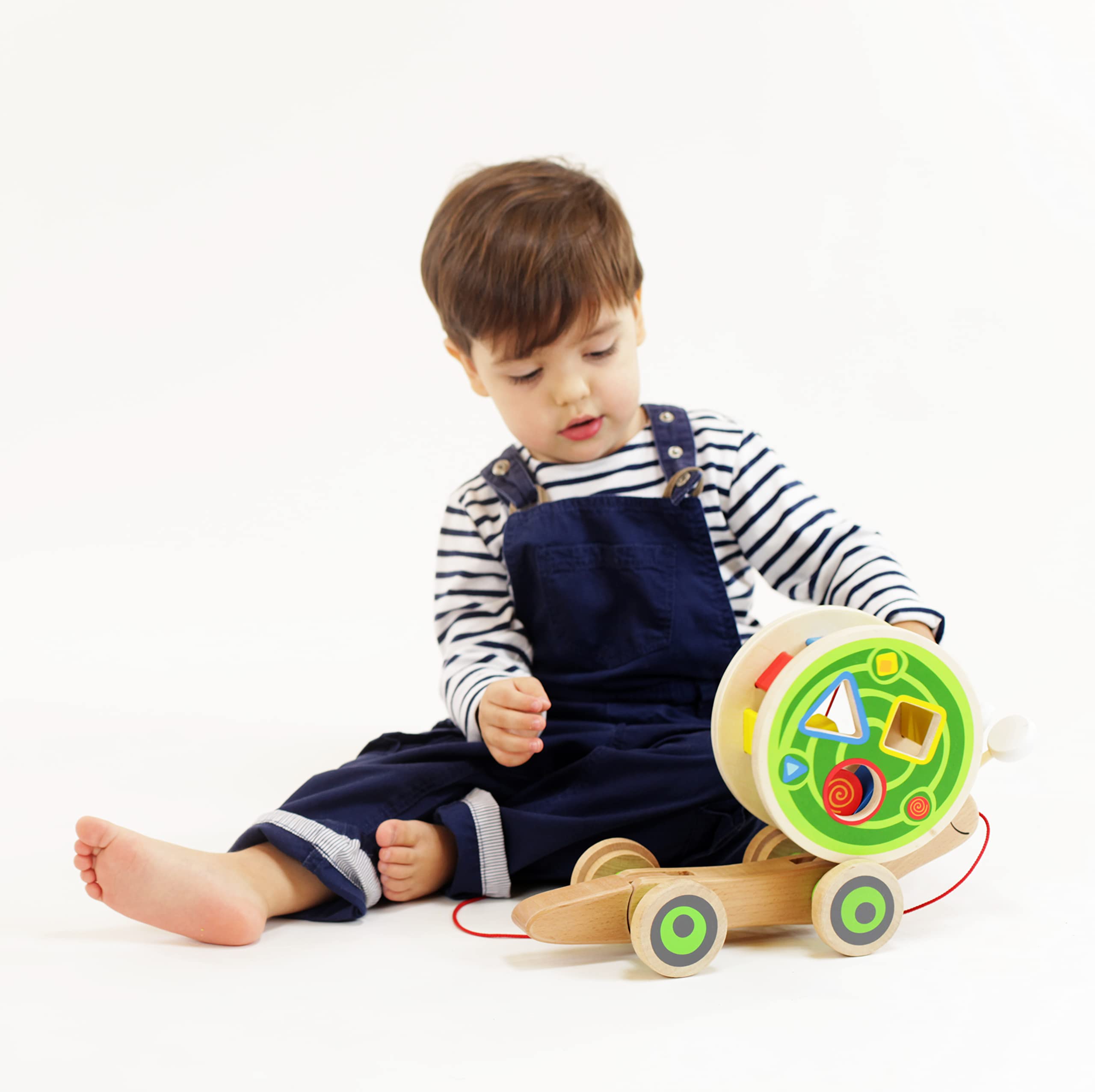 Hape Spingi e cammina Lumaca da trainare giocattolo in legno con forme a incastro