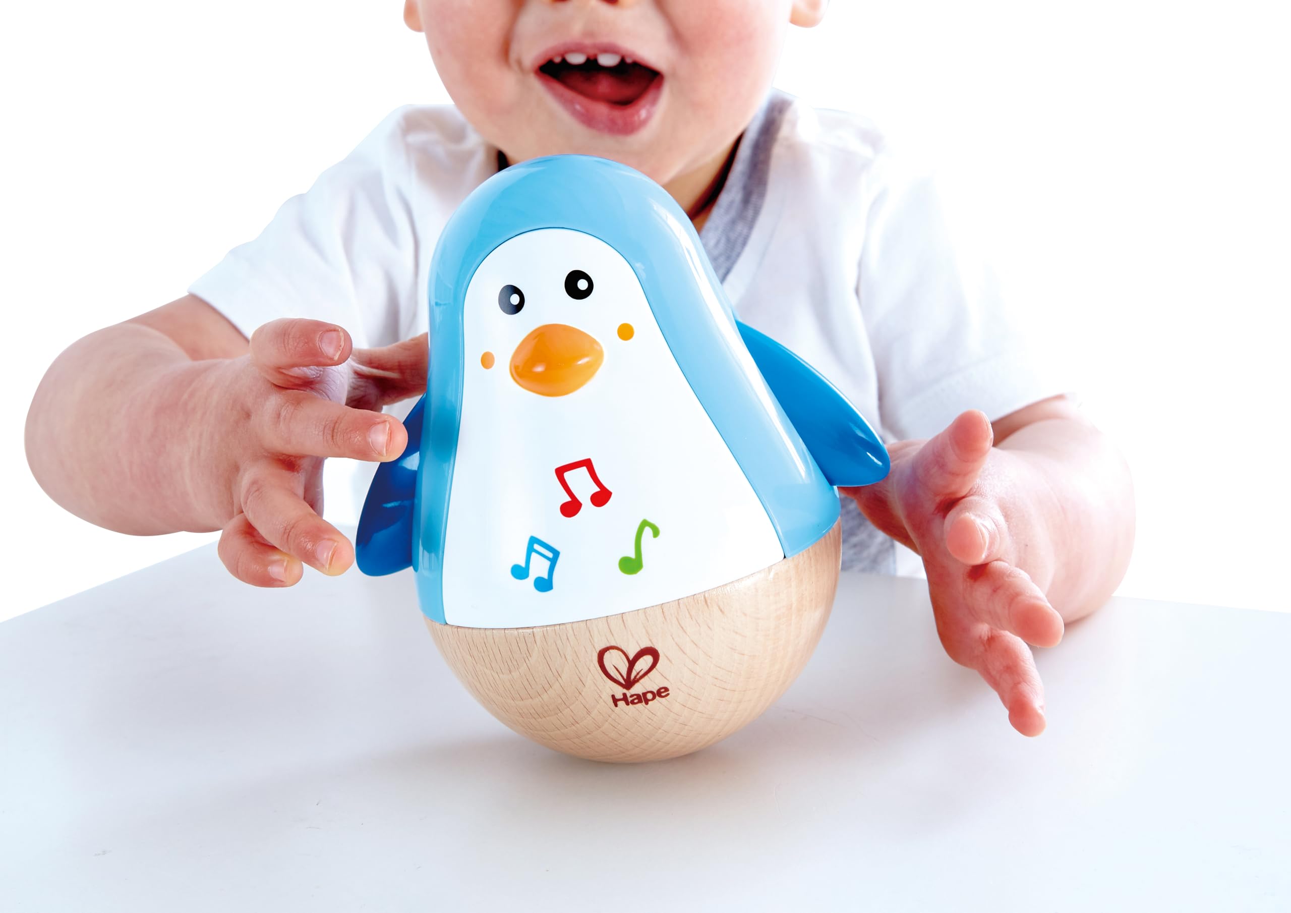 Hape Giochi musicali Pinguino Musicale Oscillante giocattolo in legno