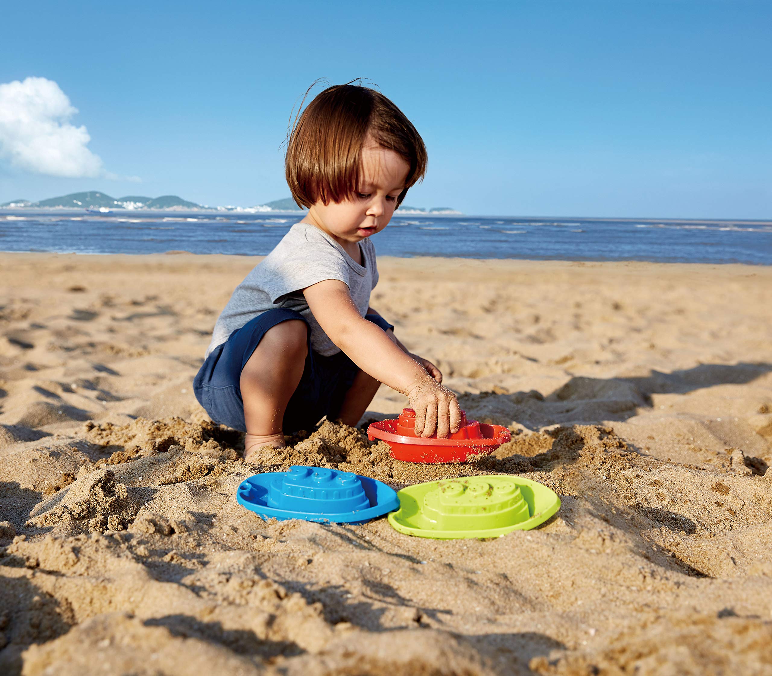 Hape Giochi da spiaggia Barchette impilabili 3 pezzi multicolore forate