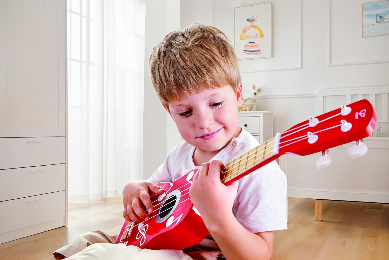Hape Giochi musicali E0603 ukulele rosso in legno