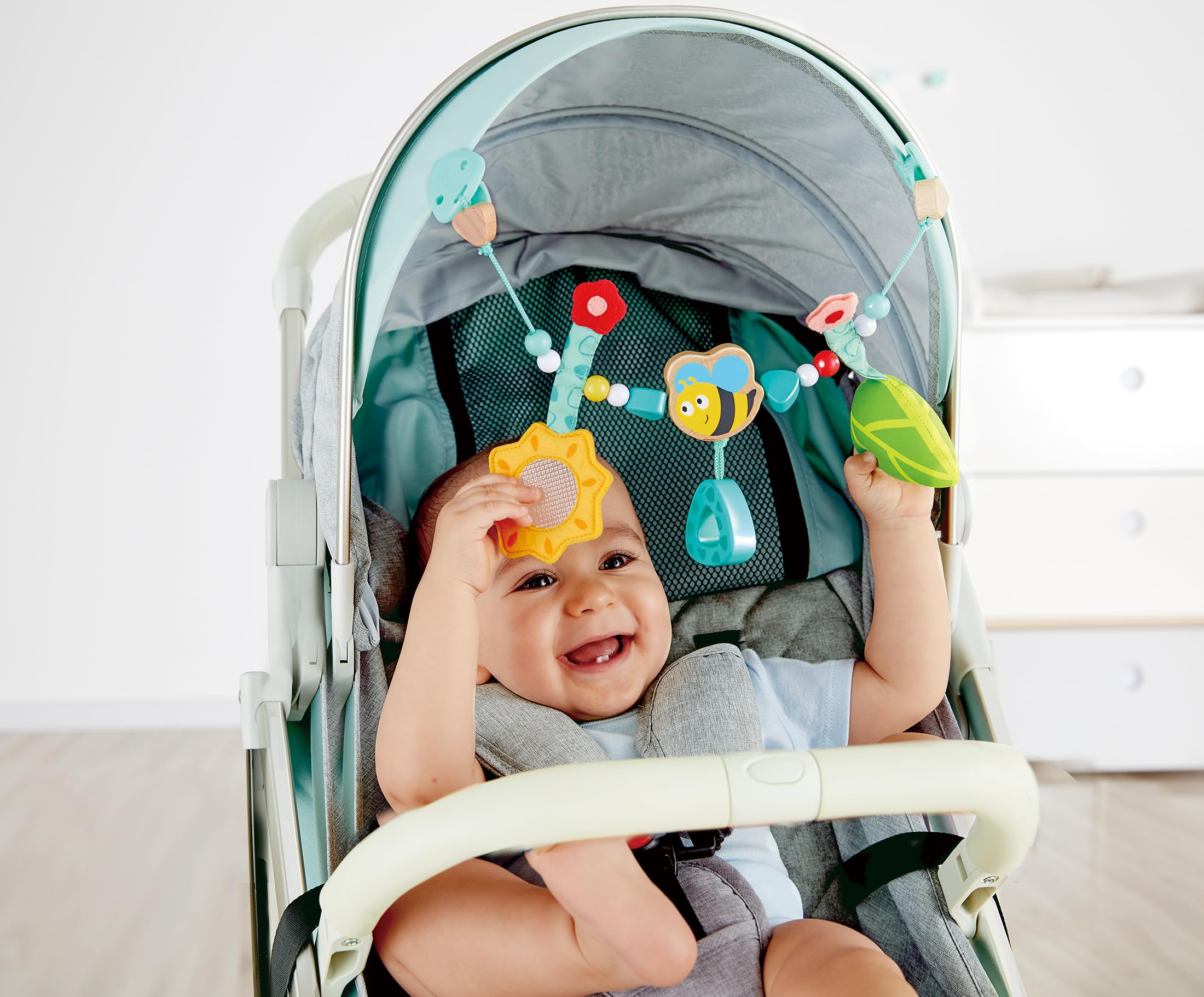 Hape Giocattoli per l'infanzia Gioco per carrozzina sonaglio ape e girasole