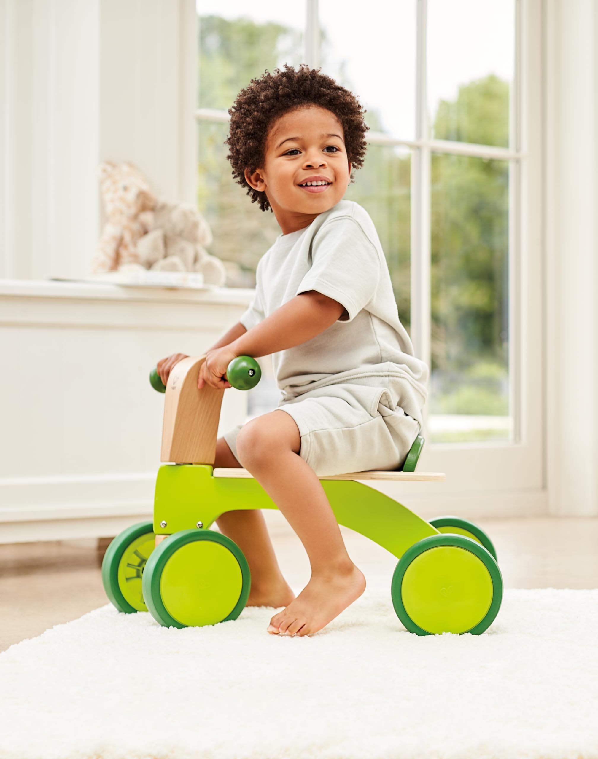 Hape Primi passi e bici Scooter a 4 ruote scooter in legno dai 12 mesi