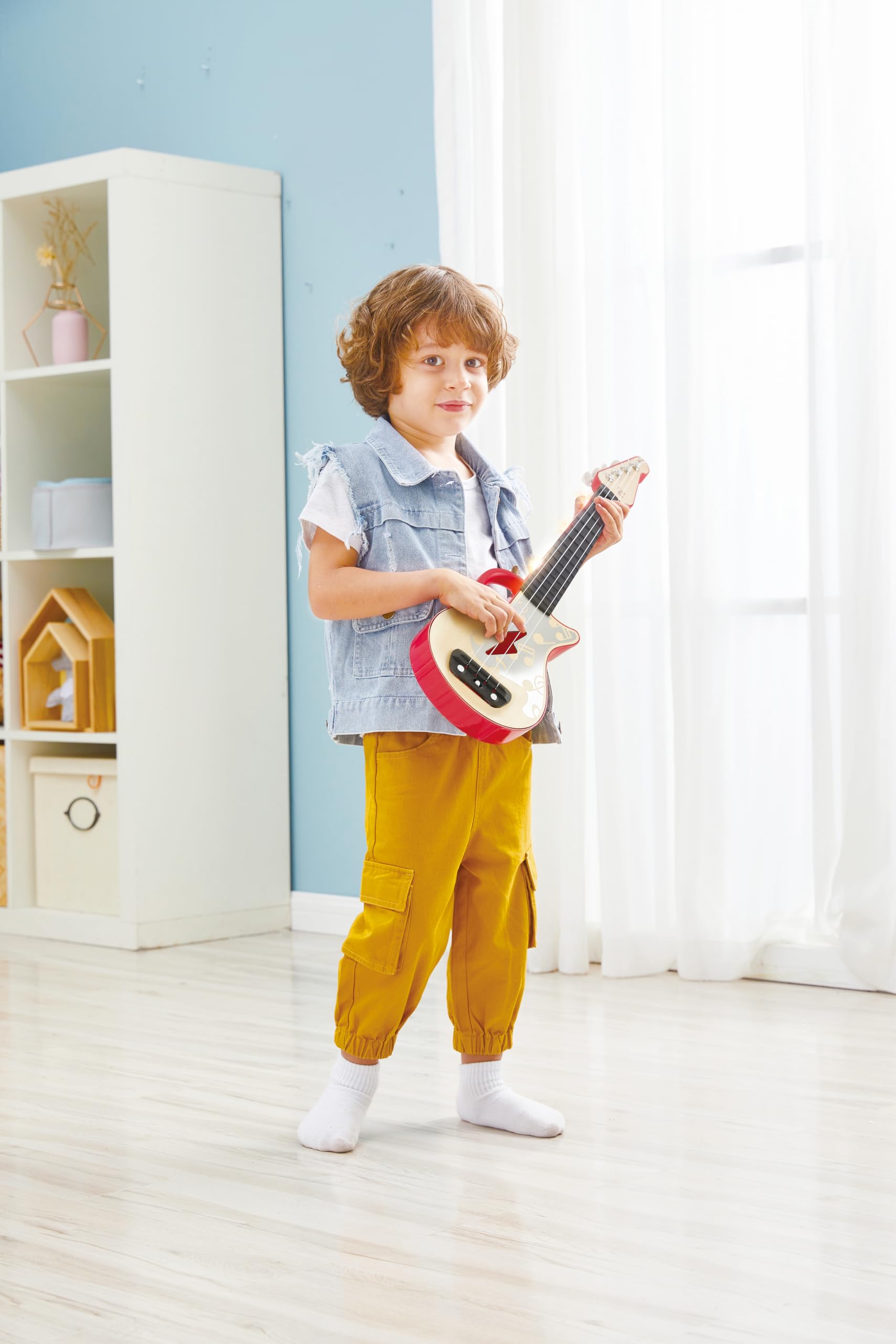 Hape Giochi musicali Ukulele Rosso ukulele rosso con luci