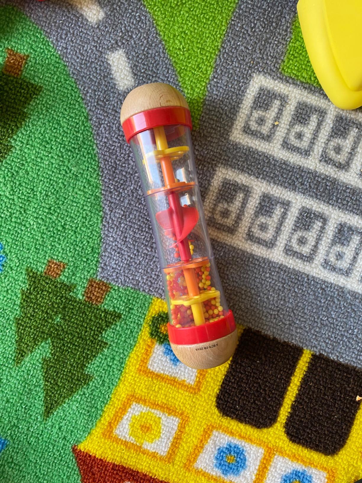 Hape Giochi musicali Cascata di Perline bastone della pioggia rosso