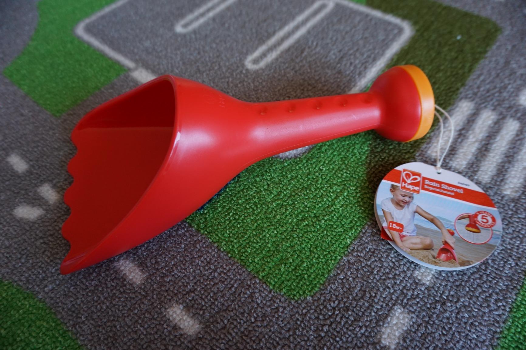 Hape Giochi da spiaggia Paletta con innaffiatoio rossa gioco sabbia