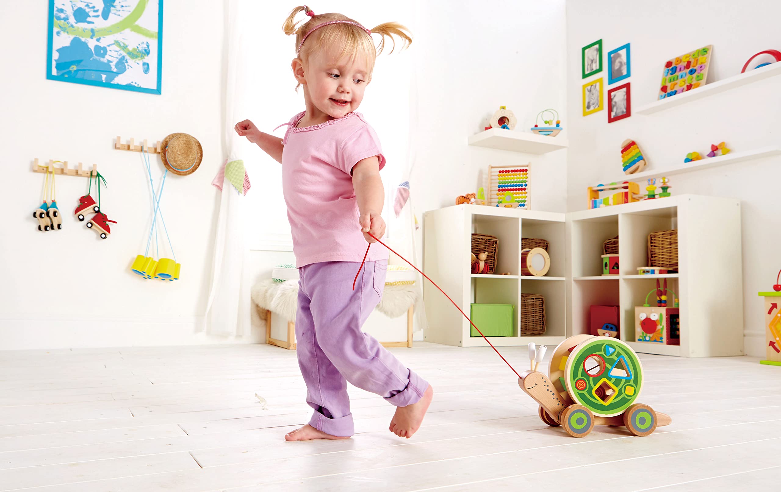 Hape Spingi e cammina Lumaca da trainare giocattolo in legno con forme a incastro