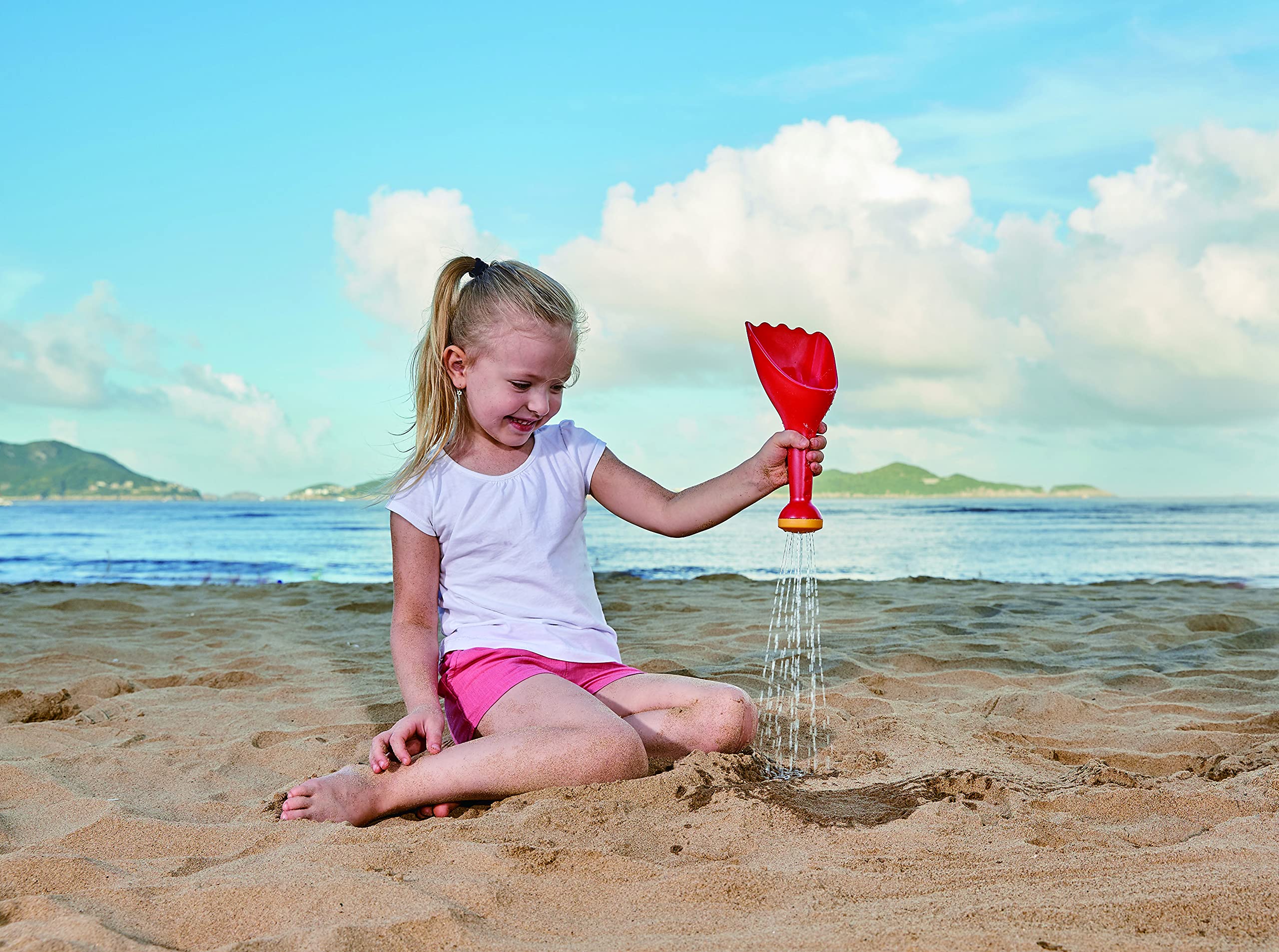 Hape Giochi da spiaggia Paletta con innaffiatoio rossa gioco sabbia