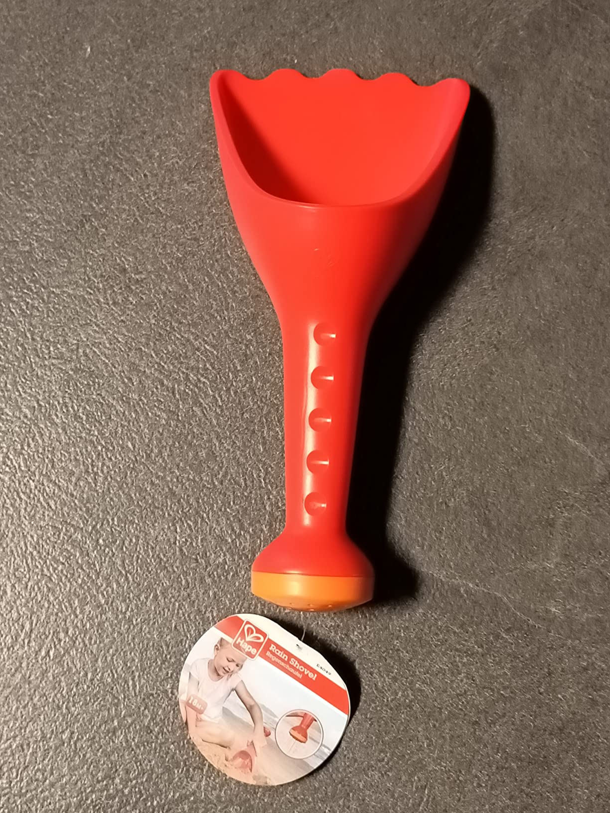 Hape Giochi da spiaggia Paletta con innaffiatoio rossa gioco sabbia