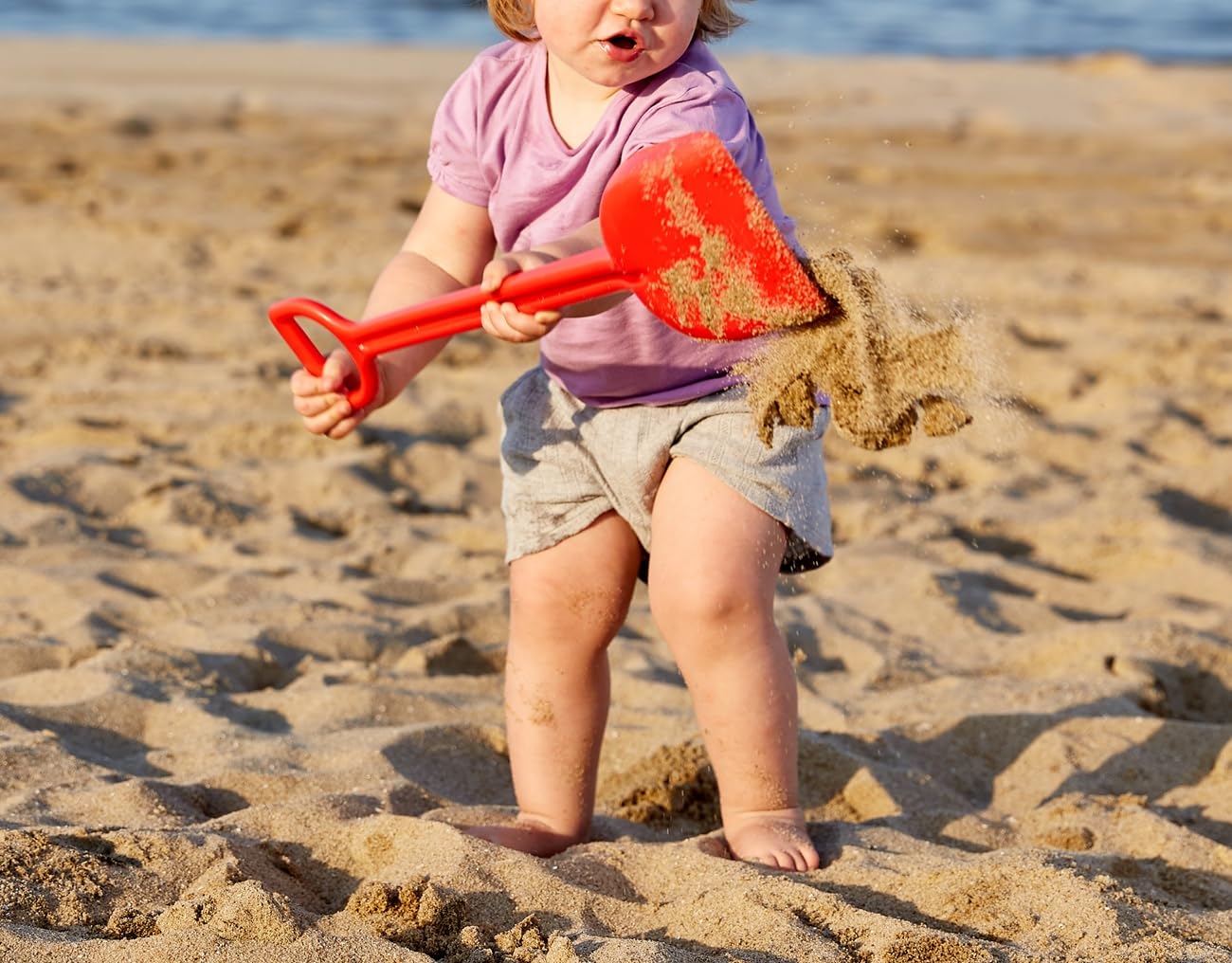 Hape Giochi da spiaggia Paletta Portentosa rossa