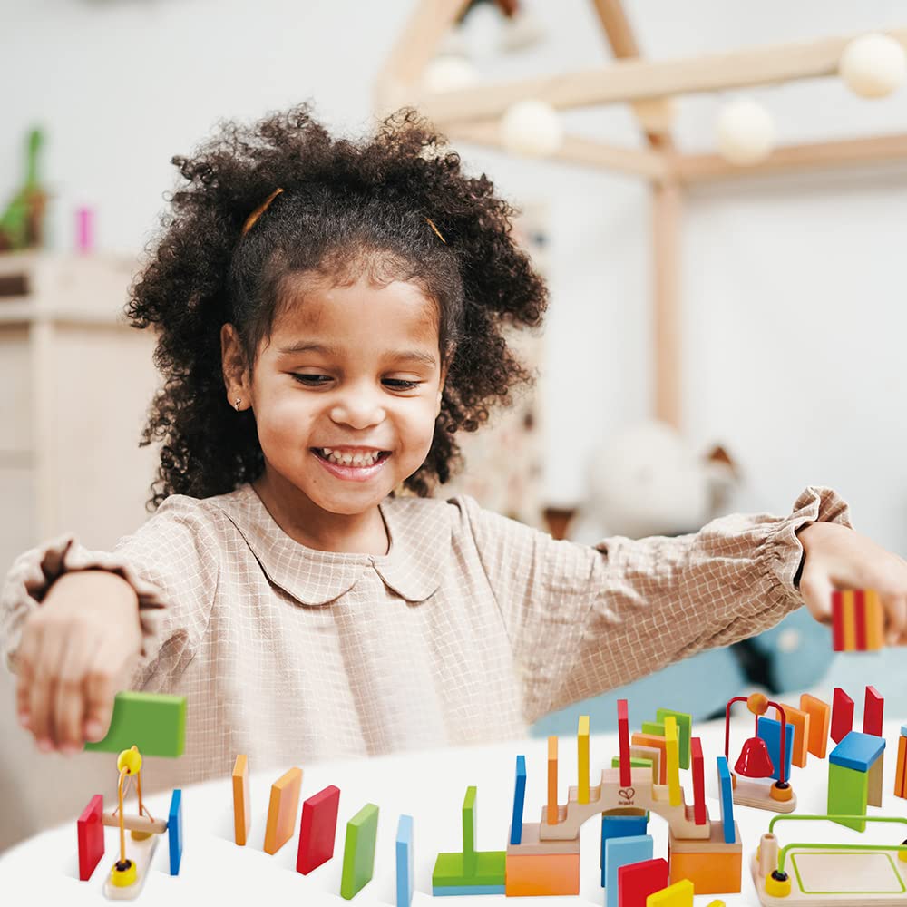 Hape Montare e costruire Set di Domino Dinamici domino in legno 107 pezzi multicolore
